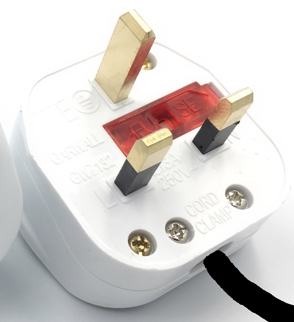 Image of the three pins of a standard UK plug with a red cover over the fuse